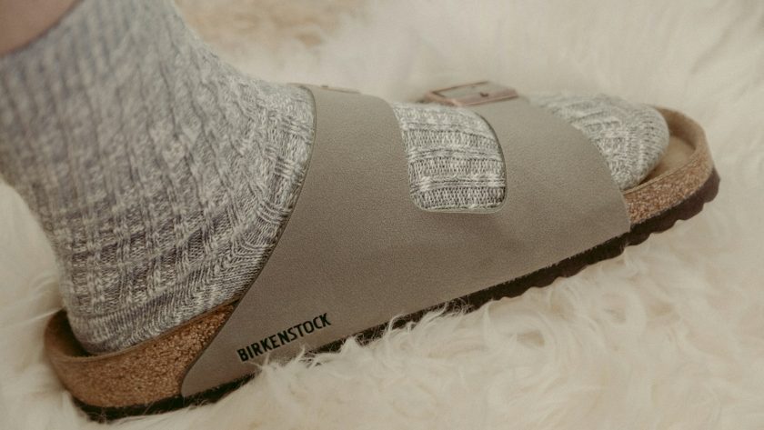 gray and brown sock on white textile